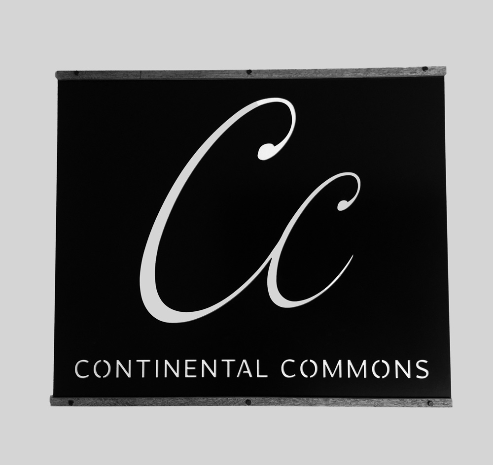 Continental Commons metal sign